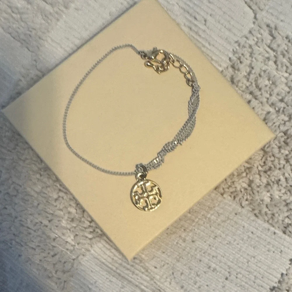 Tory Burch Gold white twisted bracelet - Picture 3 of 4